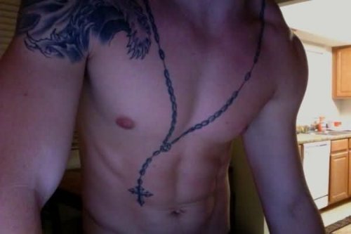 Man With Rosary Neck Chain Tattoo